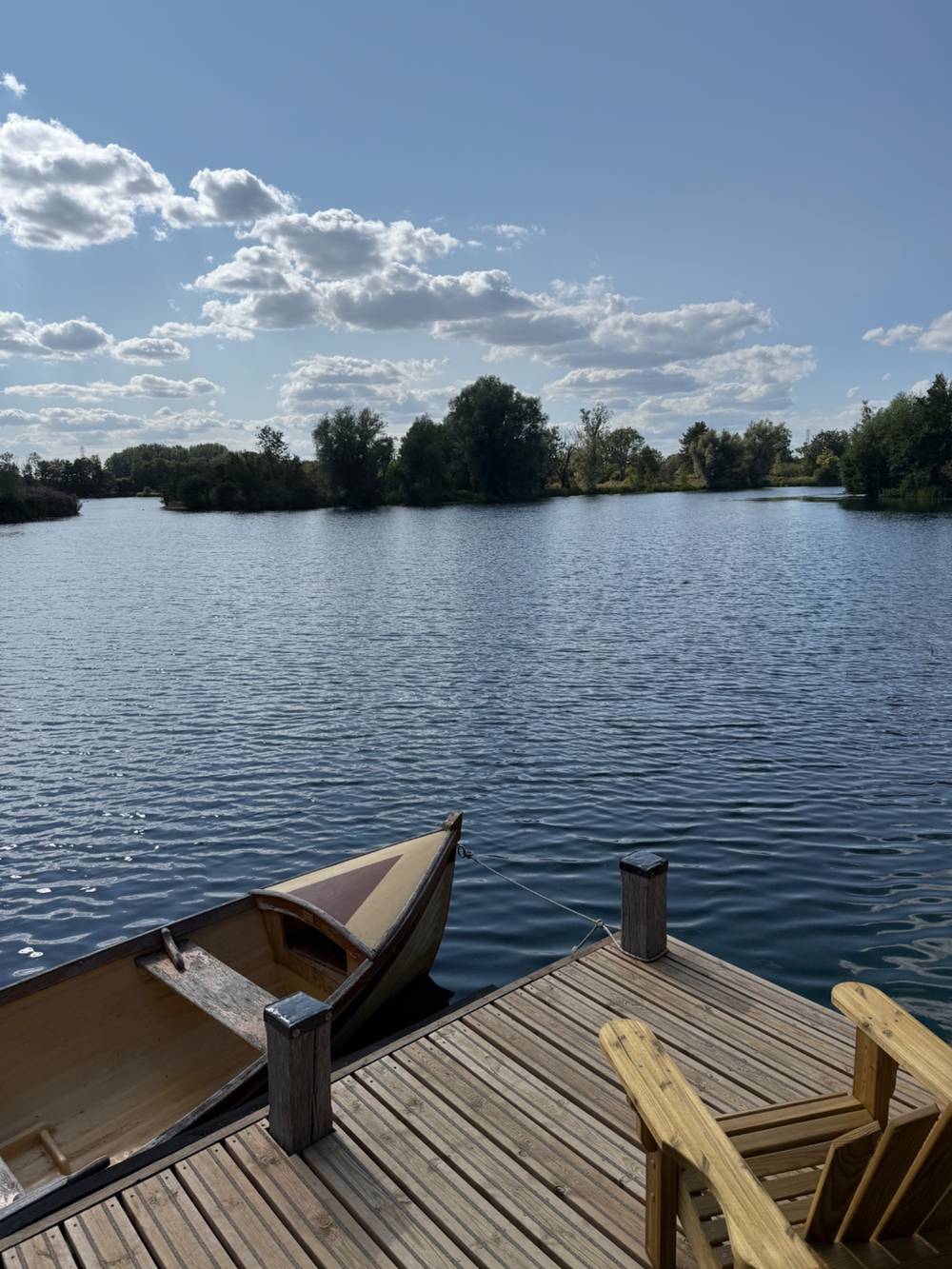 Lake with a rowboat and deck