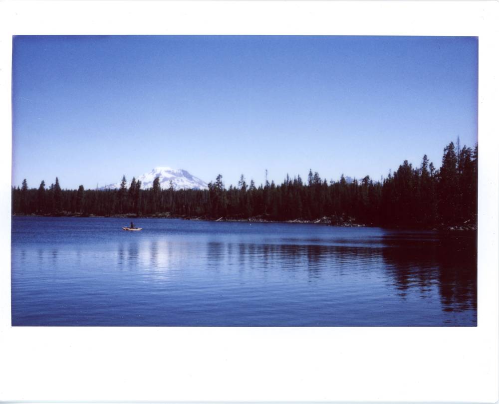 Lava Lake at day, with South Sister (mountain) reflected in the center