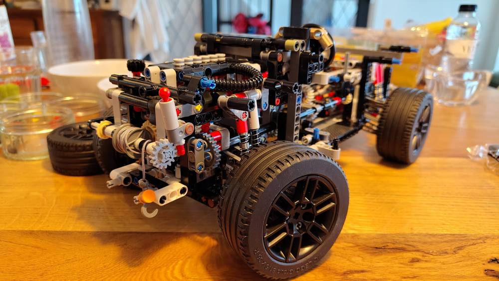 Front-side view of the first 350-ish steps of building Lego's Landrover Defender 42110