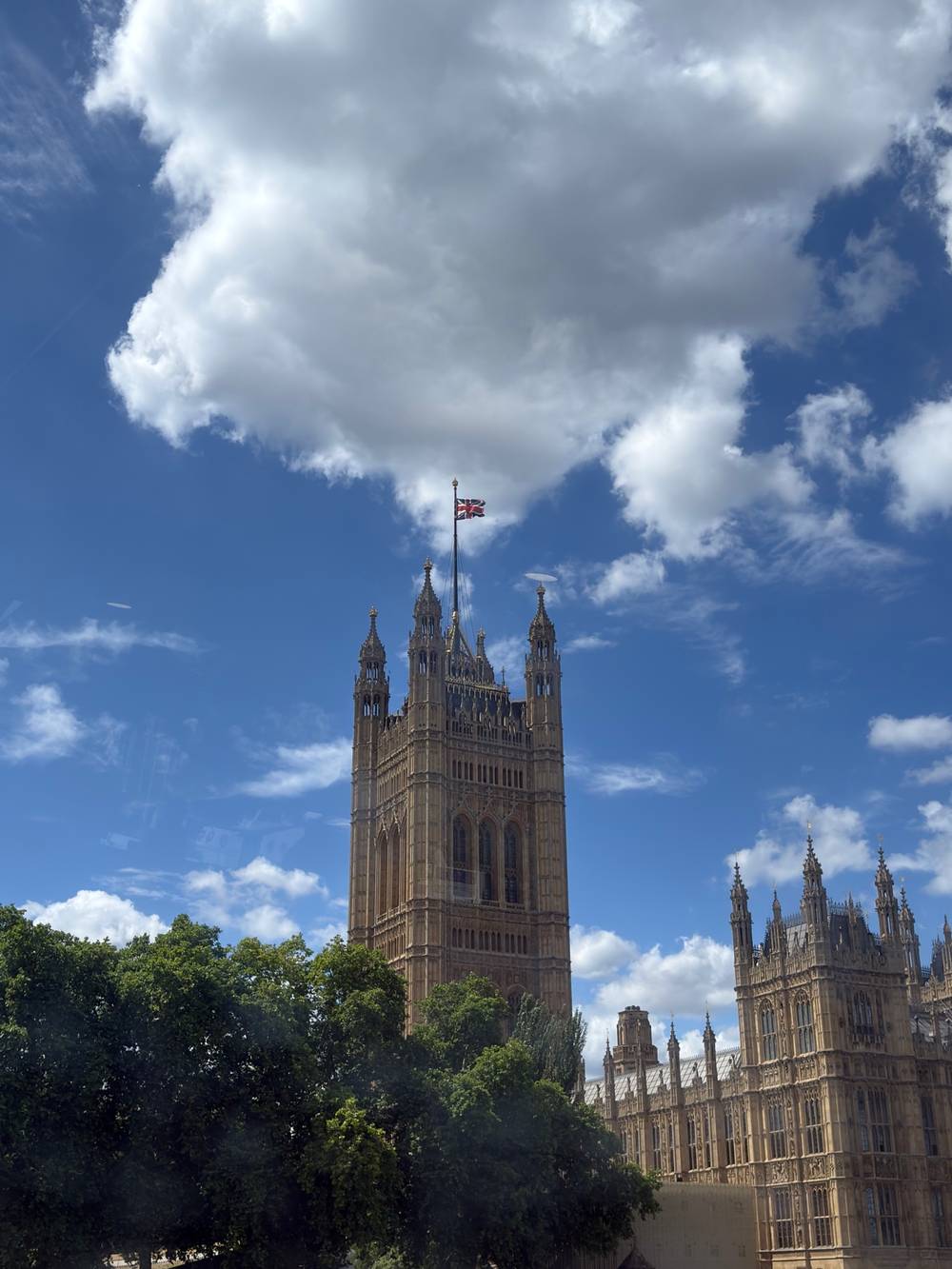 Another photo of some building at parliament with the British flag (Union Jack) at the top flying⁠