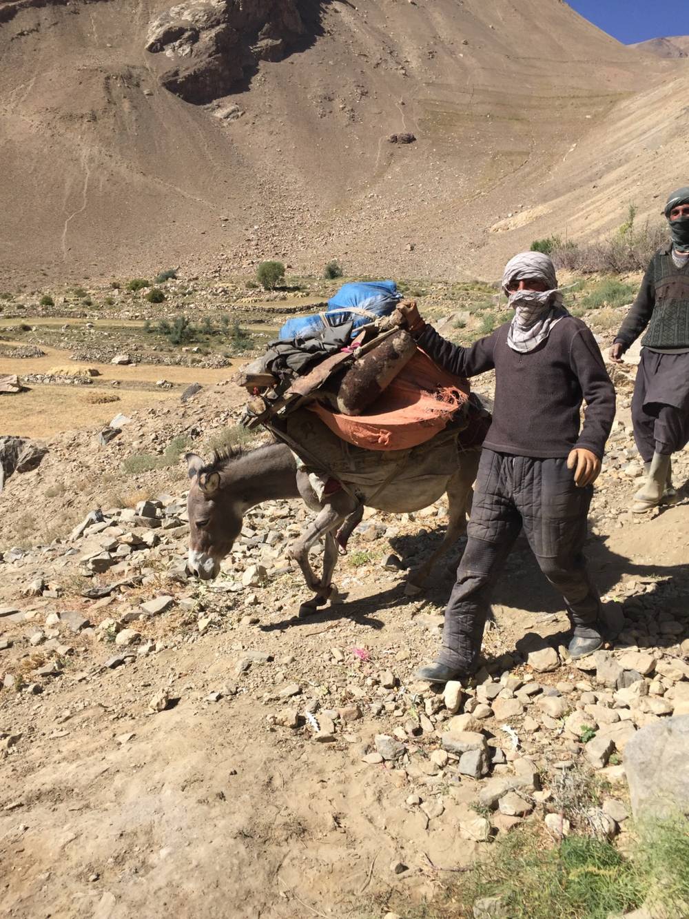 Young men returning from the mountains where they stay during the peak summer heat