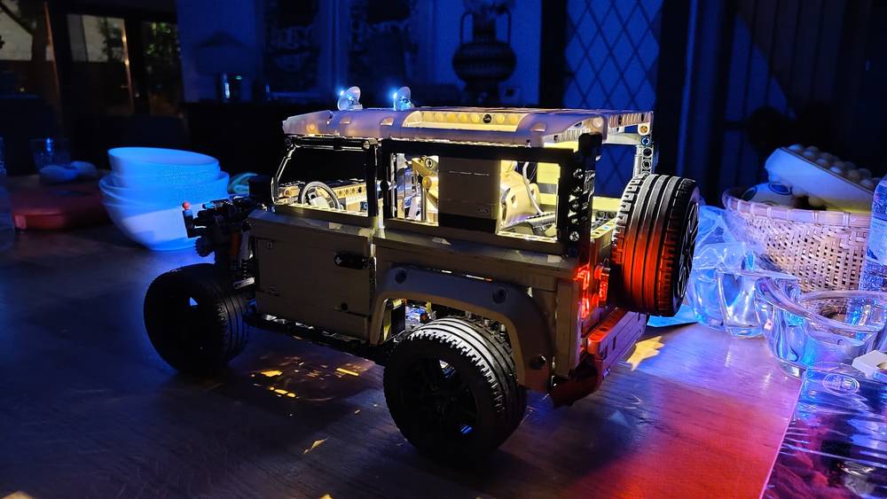 Partially finished Lego Landrover Defender lit up by LEDs