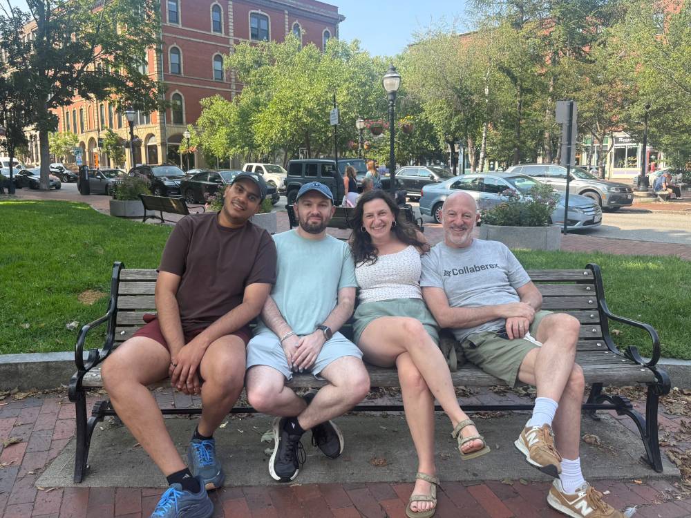 Alex’s family on a bench in Portland, ME