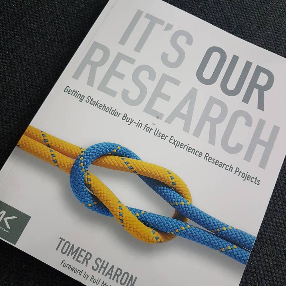 The cover of the book "It's Our Research" by Tomer Sharon, about UX stakeholder buy-in.