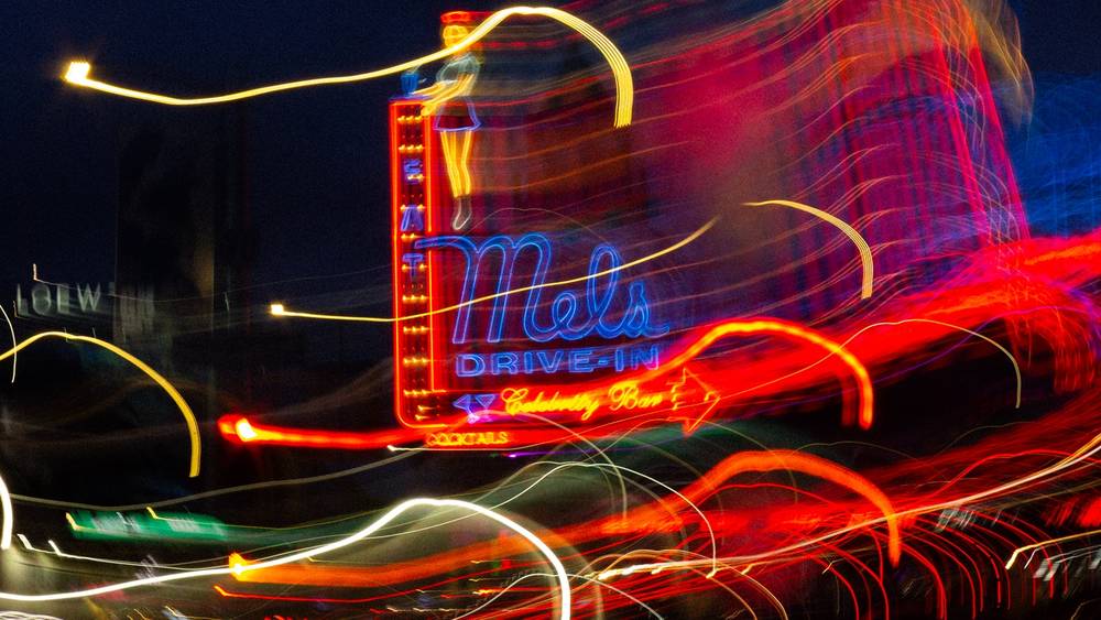 Mel's neon signage, motion blurred
