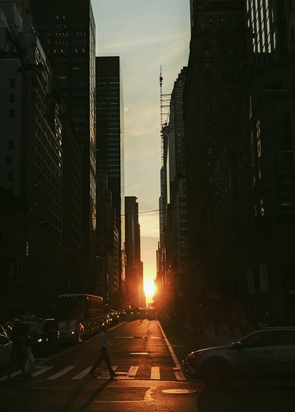 orange sunset between tall buildings