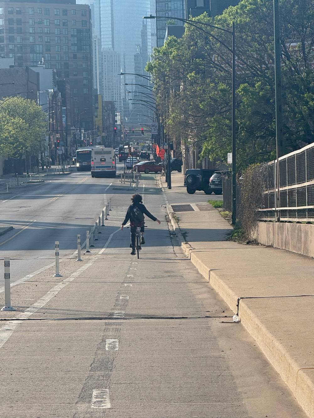 zoomed in, person riding no hands