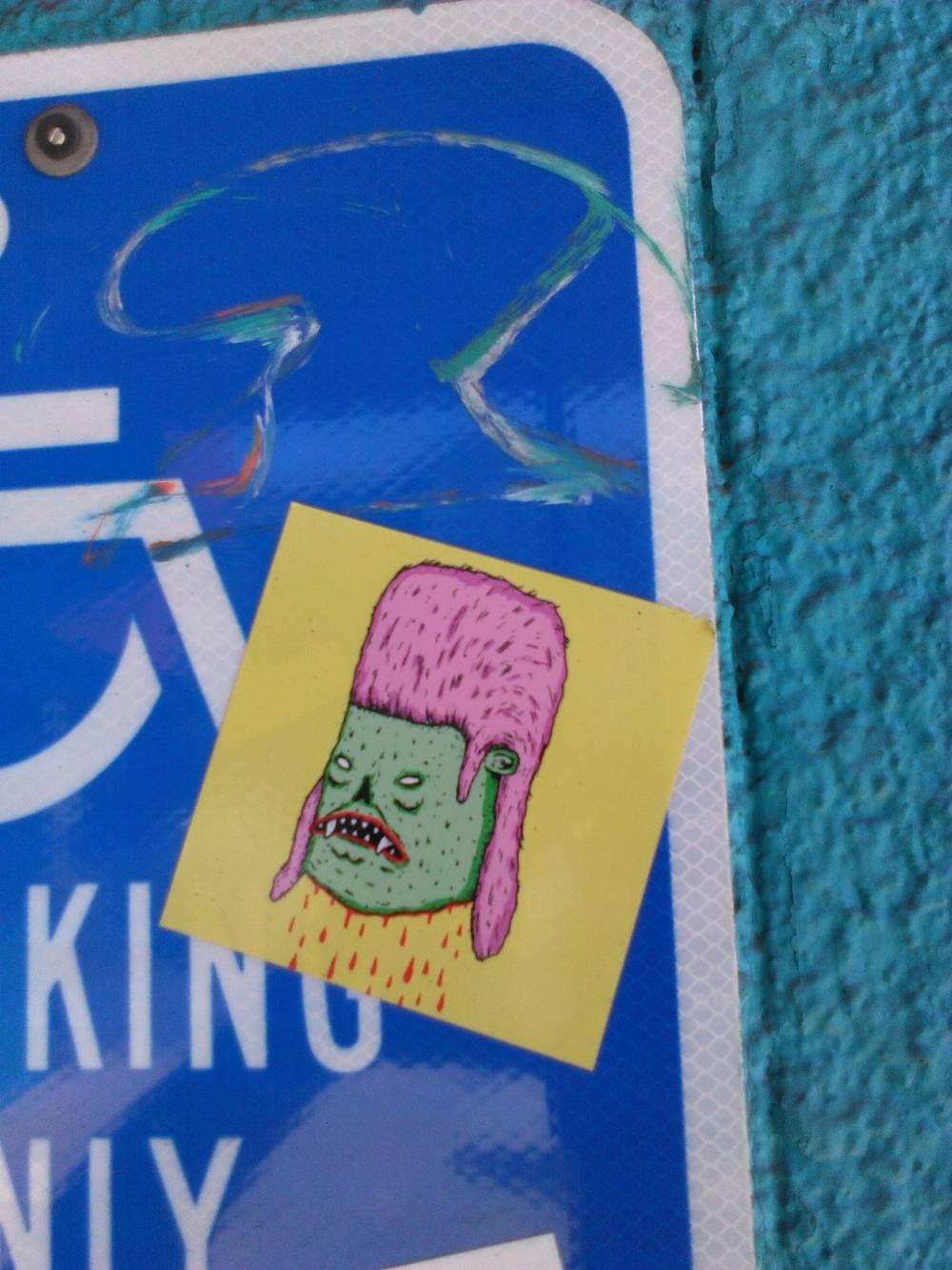 Sticker of a cartoon severed head