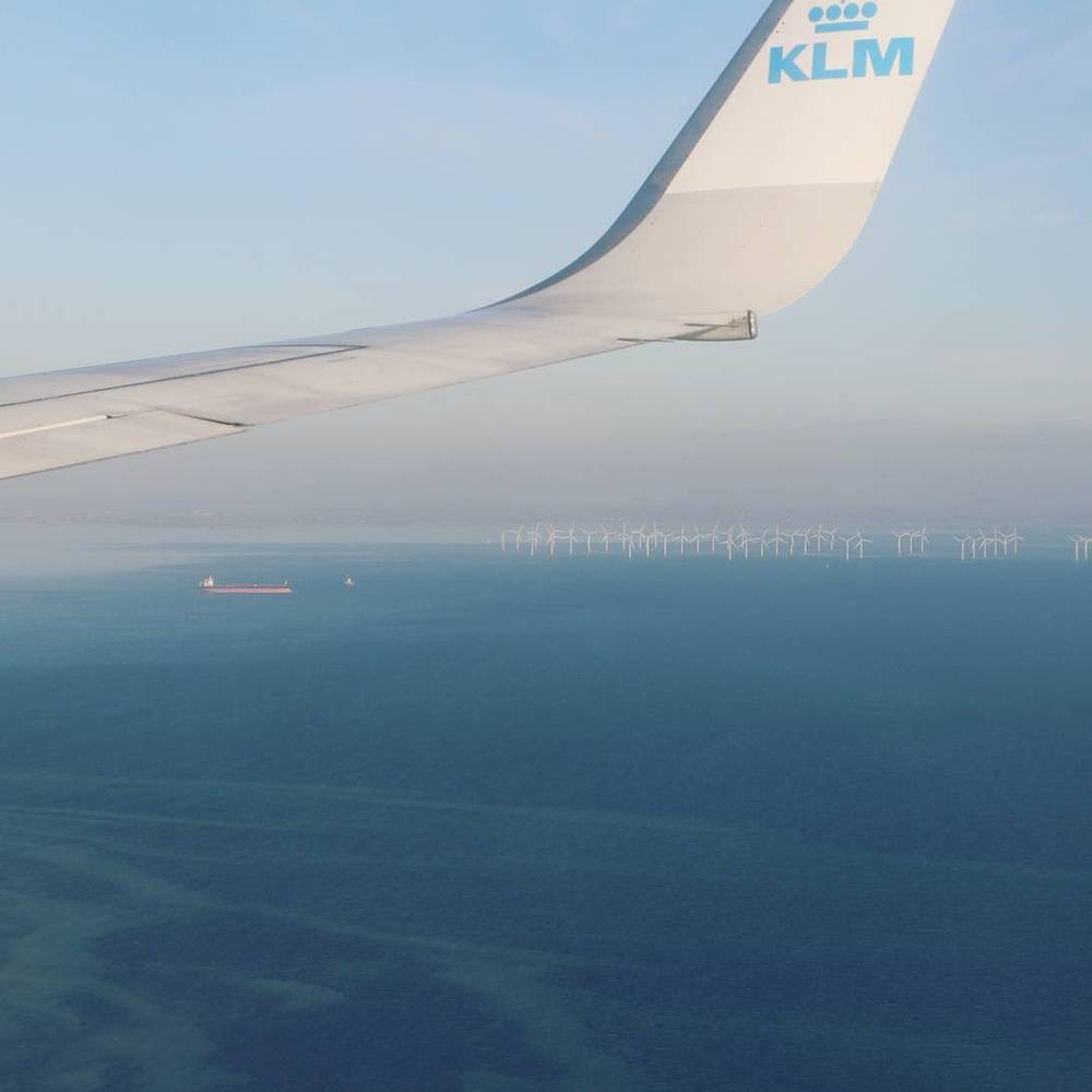 Airplane, wind turbines, tanker