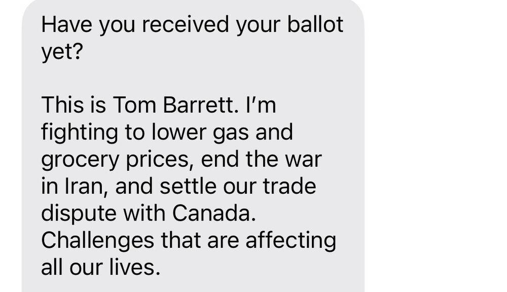A text message from Tom Barrett asks if the recipient has received their ballot and mentions his efforts to lower gas and grocery prices, end the war in Iran, and resolve a trade dispute with Canada.