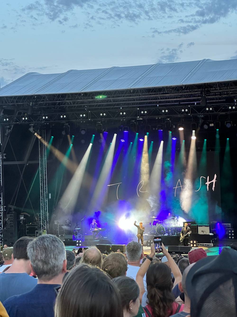 Suede at Ally Pally. Background text: Trash