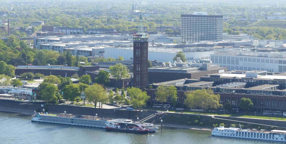 View onto the old exhibition center (now accommodating the television station RTL), and the site of the new exhibition center behind.