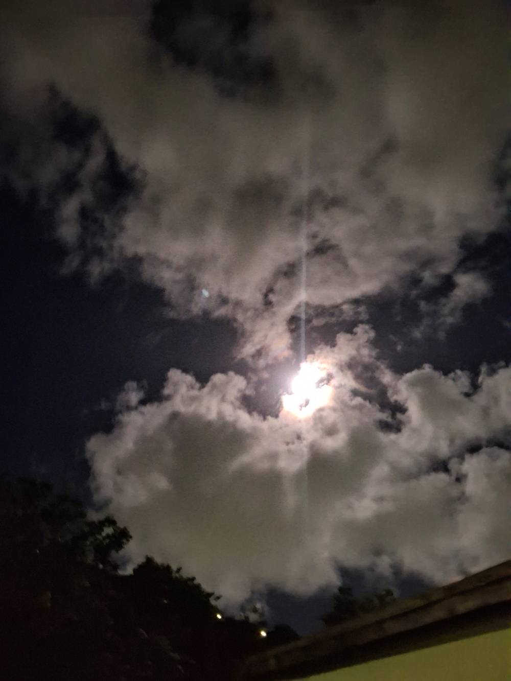 Moon thru Clouds at night