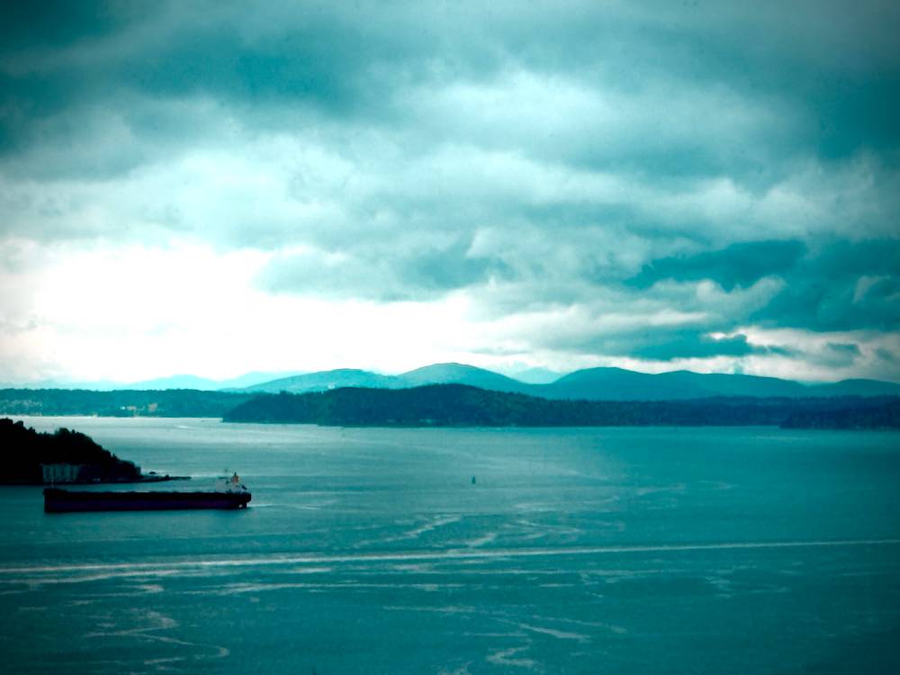 An overcast view of a container ship in the Puget Sound