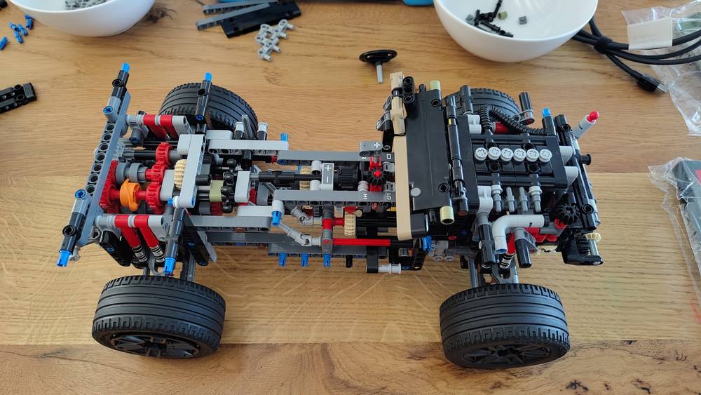 Top-down view of the first 350-ish steps of building Lego's Landrover Defender 42110