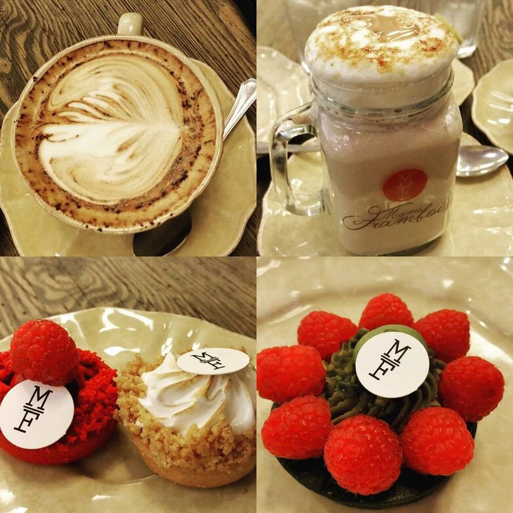A collage of a latte with foam art, a spiced drink in a jar, and small dessert tarts topped with berries.