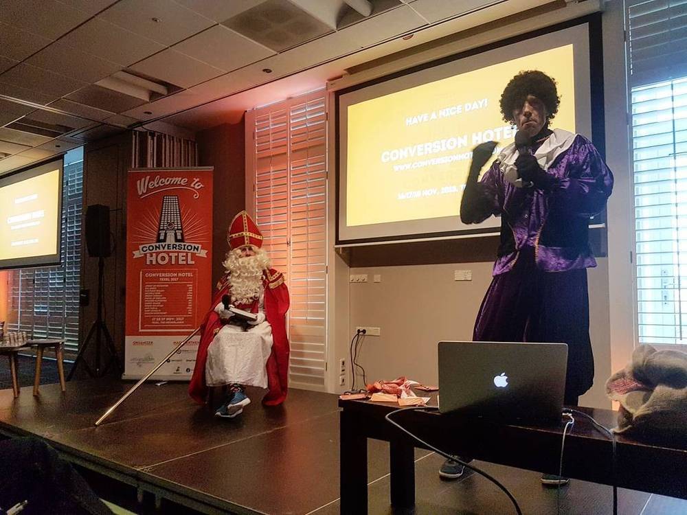 Sinterklaas and Zwarte Piet on stage at the Conversion Hotel conference.