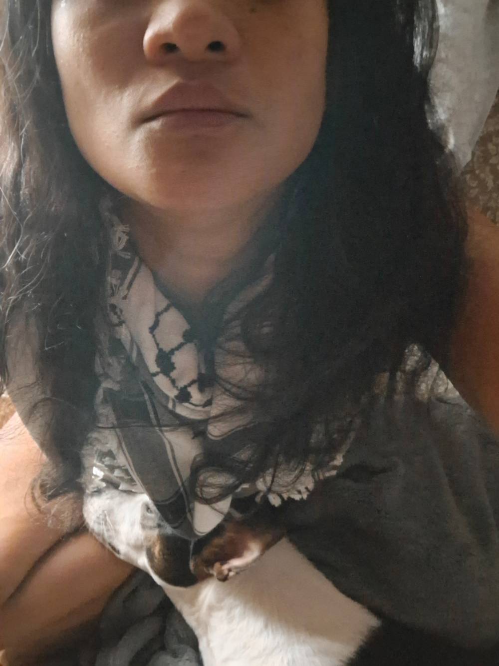 woman wearing keffiyeh. free palestine