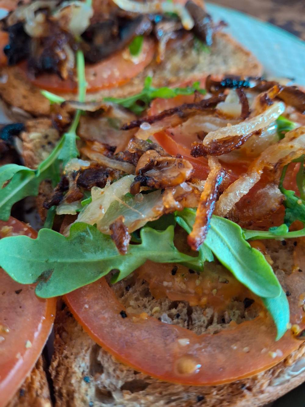 vegan meal: tomatoes and ruckula and mushrooms on toast. yum!! go vegan. leave animals alone