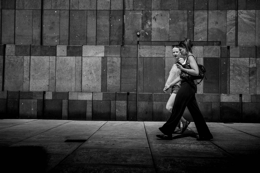 Captured moments in motion against stone and shadow
