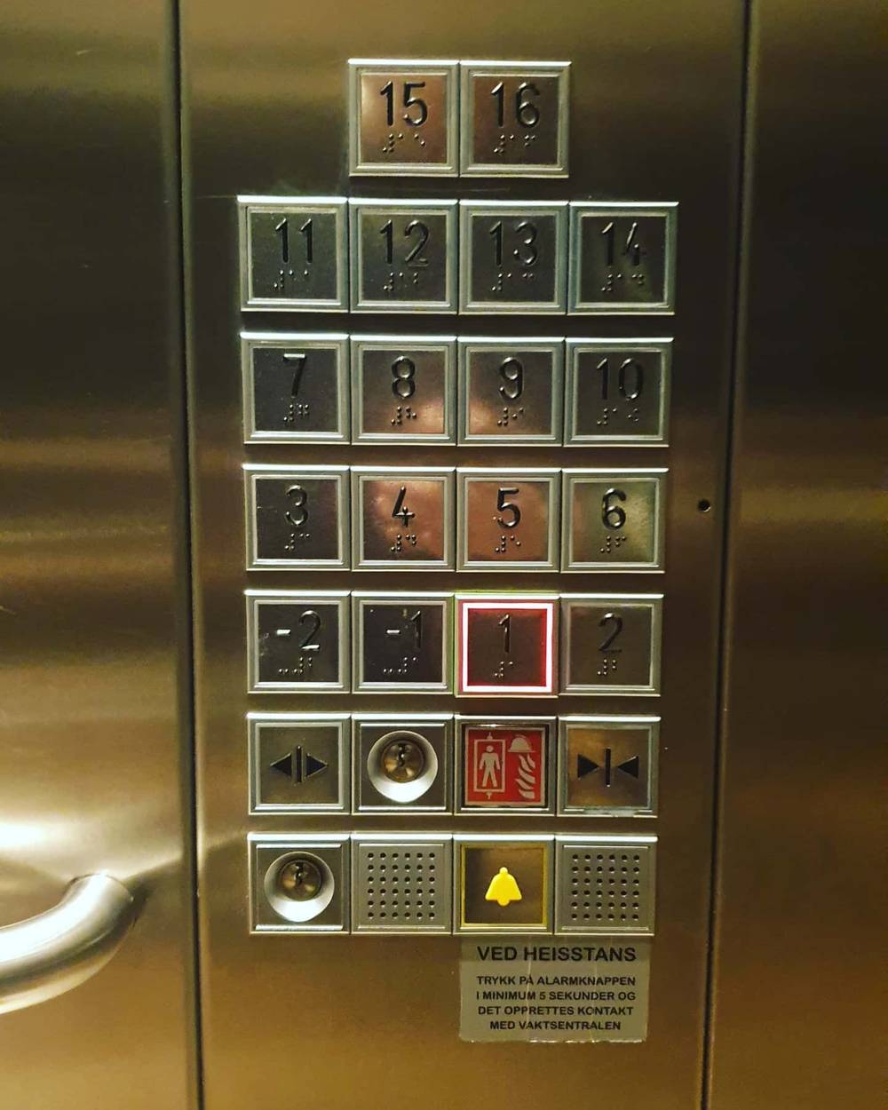 An elevator panel showing rows of floor buttons.