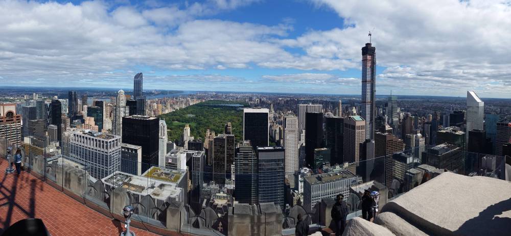Central Park's green expanse stretches beneath the Manhattan skyline from Top of the Rock.