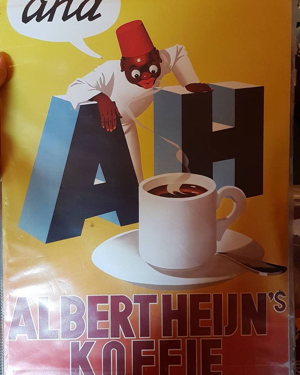 A vintage Albert Heijn coffee advertisement showing a cup of coffee and large letters spelling "AH".