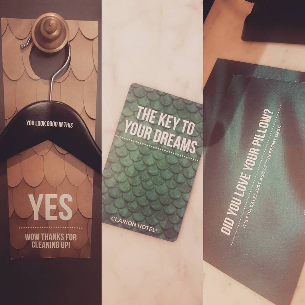 Hotel door hanger cards reading "You look good in this: YES," "The key to your dreams," and "Did you love your pillow?"