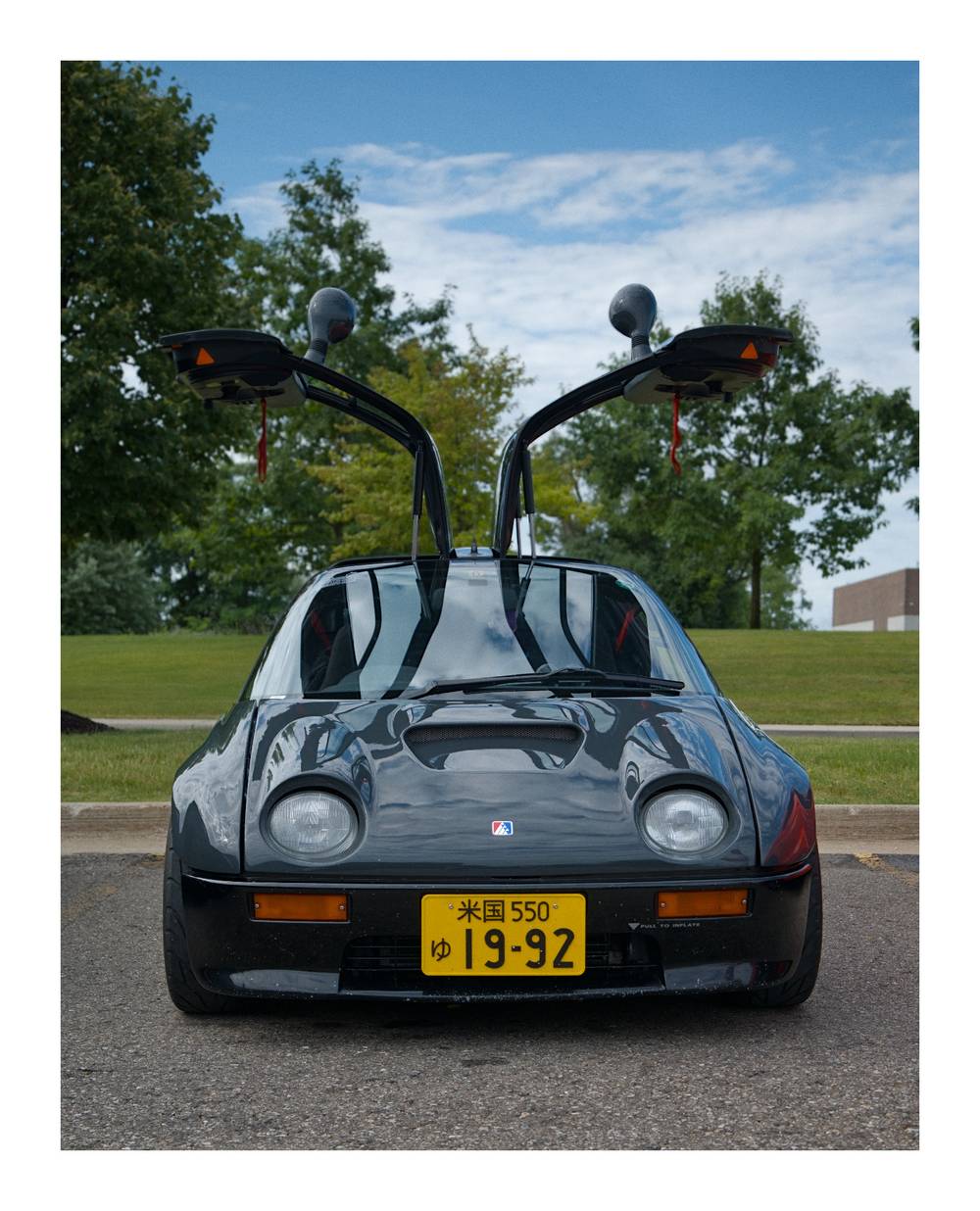 Front view of the Autozam AZ-1 with it's doors up