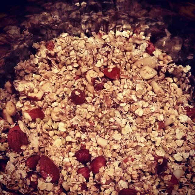 A close-up of homemade granola with oats and dried fruit.