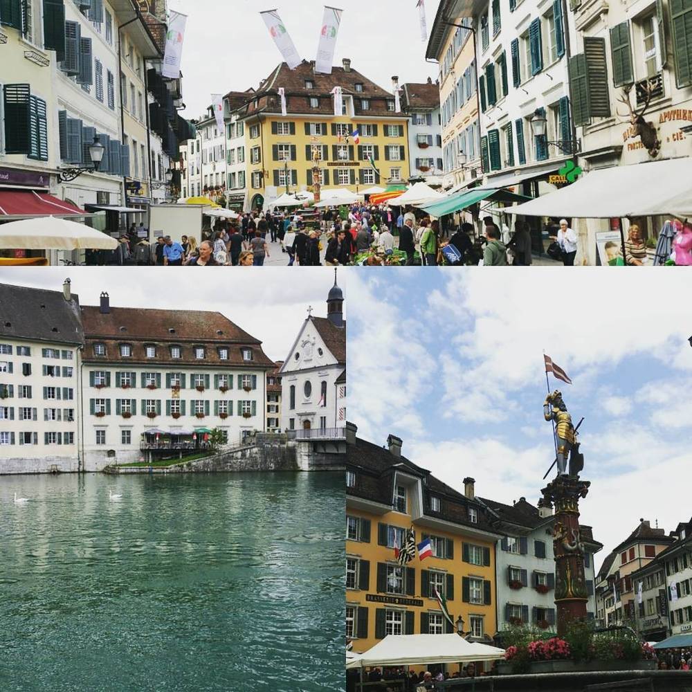 A collage of a bustling market square with striped awnings and historic buildings along a river with a fountain statue.