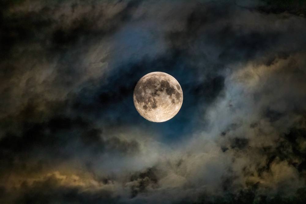 Clouds across the moon