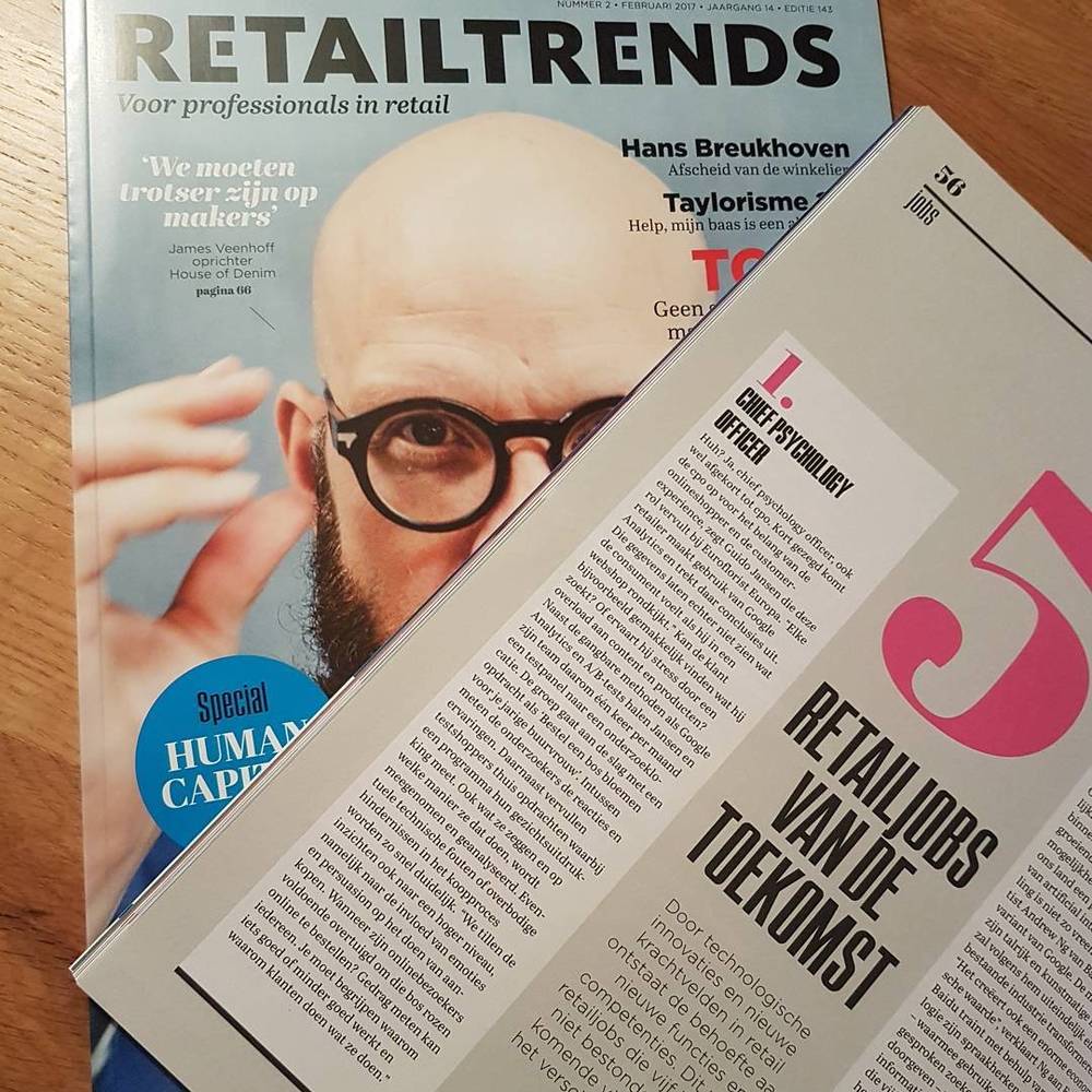A RetailTrends magazine open to an article about future retail jobs.