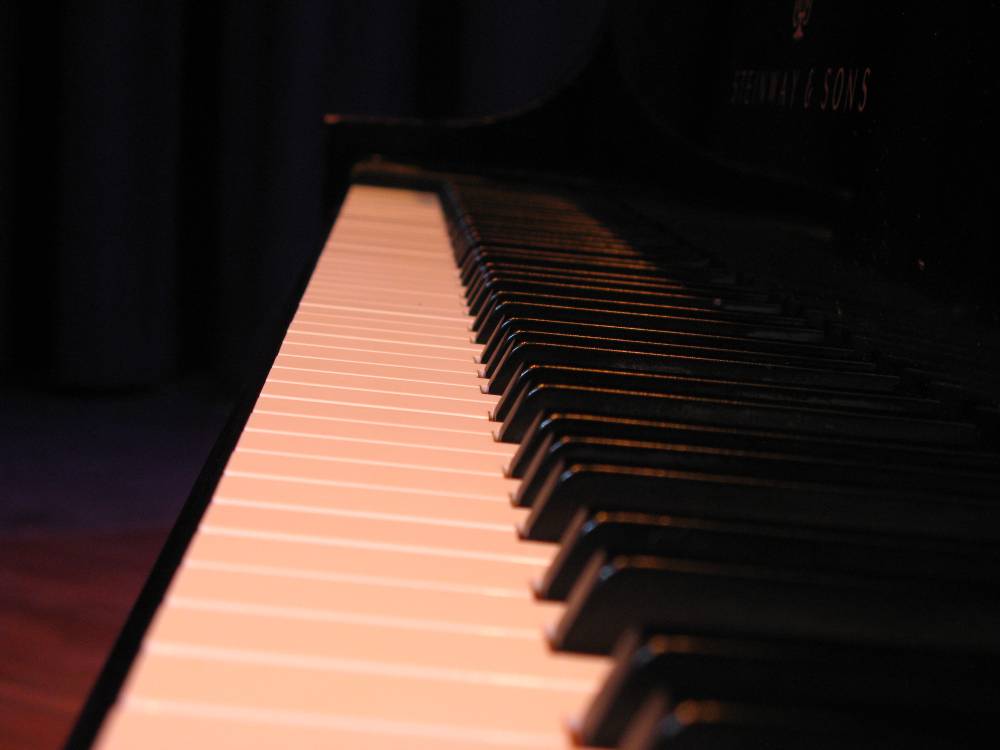 The keys of a grand piano