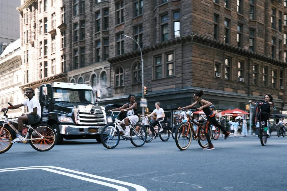 Urban Cyclists Navigate Manhattan's Historic Streets