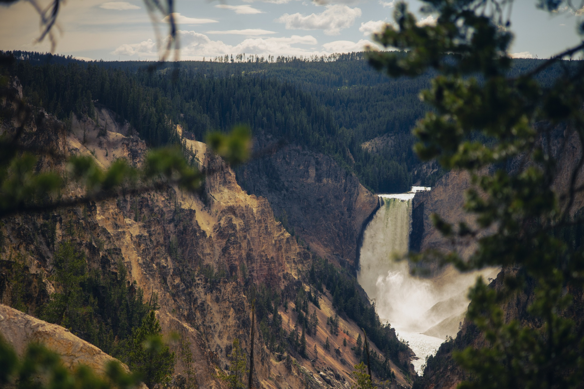 A distant waterfall in Yellowstone National Park in the United States.