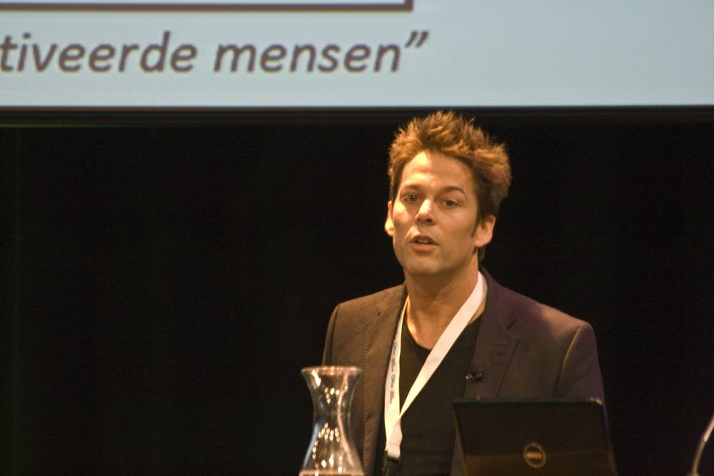 The same speaker continues presenting on buying styles psychology.